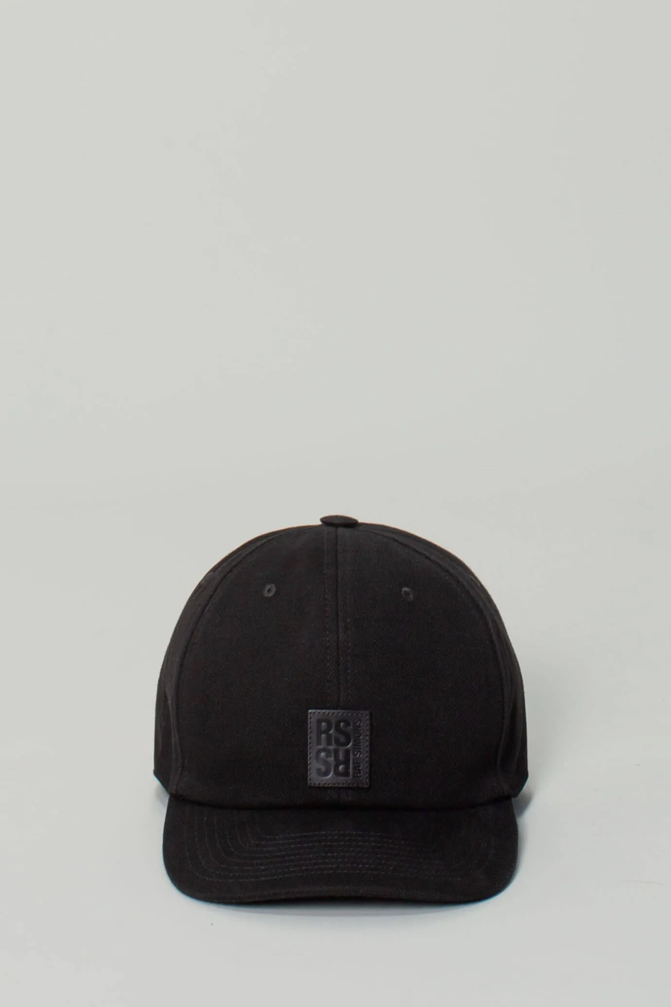 Cap with small leather patch