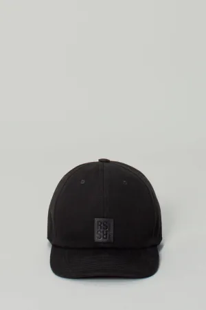 Cap with small leather patch