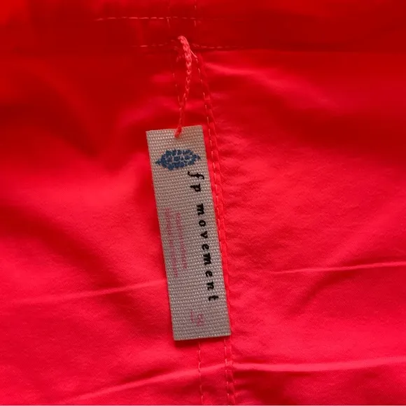 Free People Movement Hit the Hills neon coral reversible vest