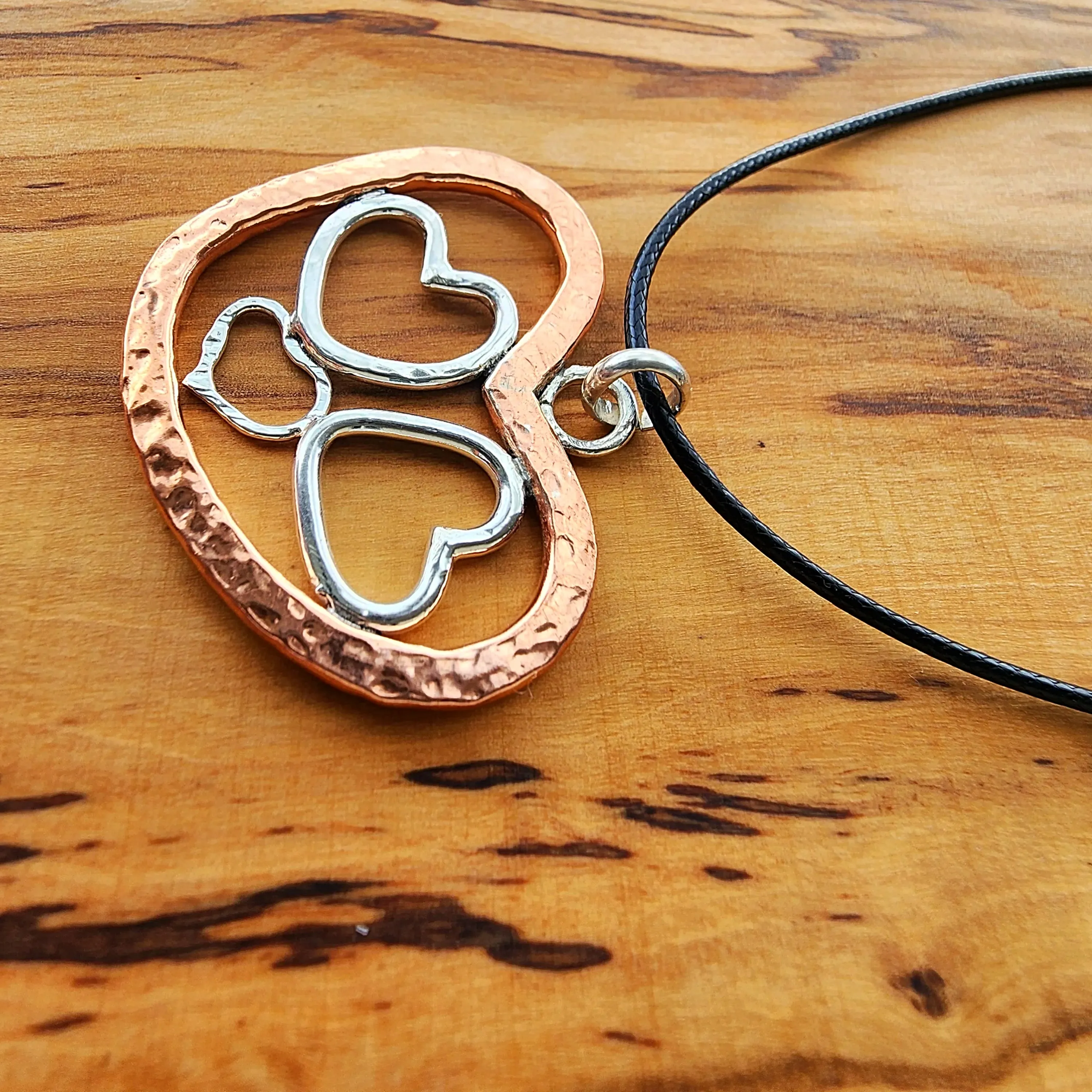 Handmade Quadruple Heart Pendant with Copper & Sterling Silver on Faux Leather