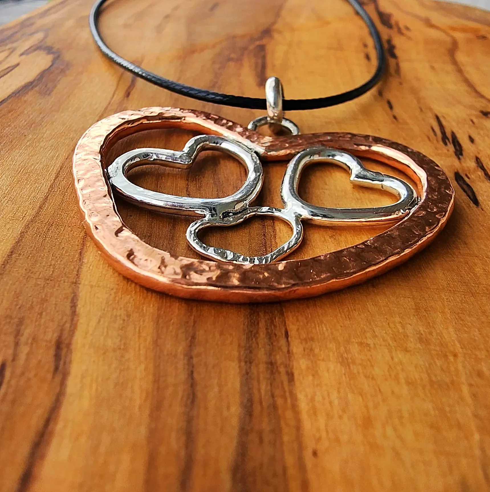 Handmade Quadruple Heart Pendant with Copper & Sterling Silver on Faux Leather