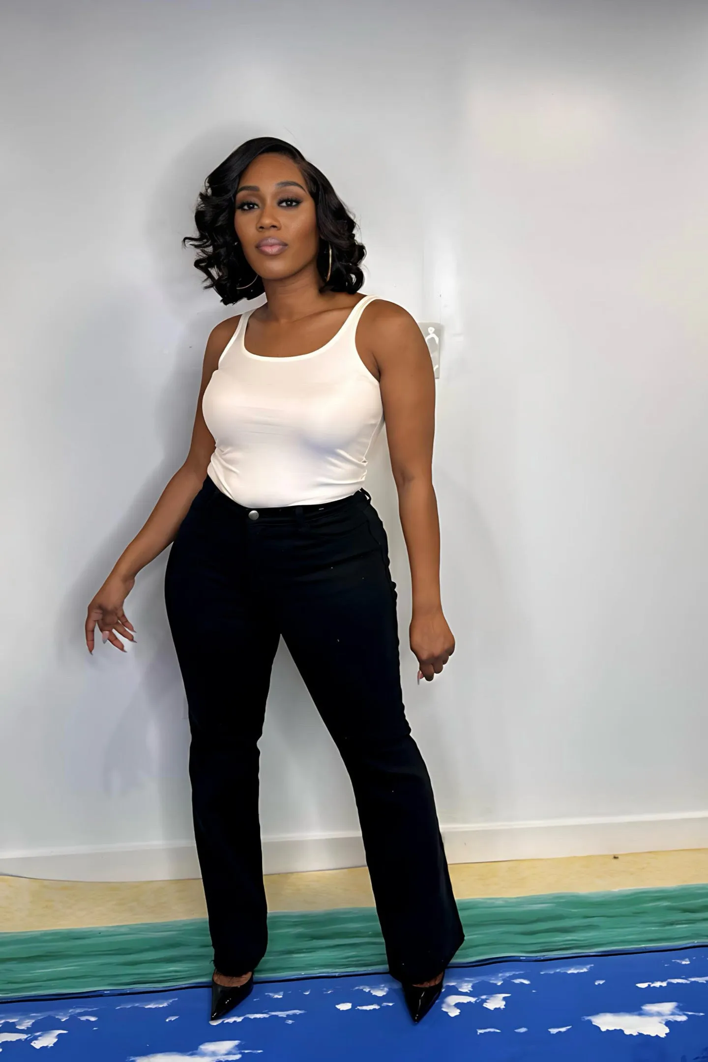 IVORY FAUX LEATHER BODYSUIT
