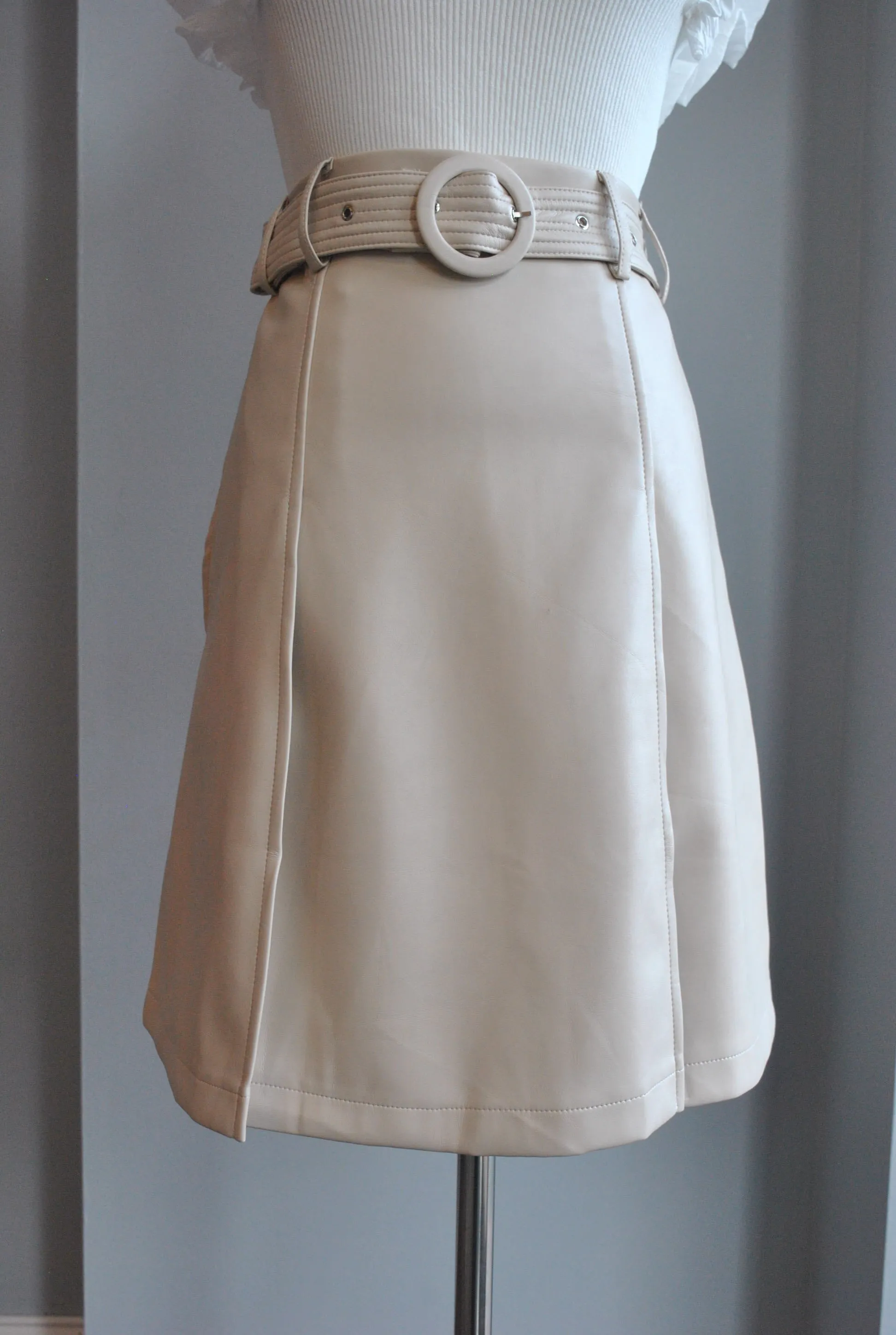 SAND COLOR FAUX LEATHER SKIRT WITH A BELT