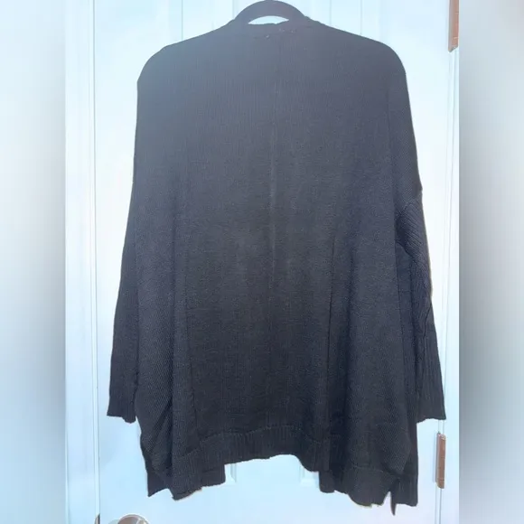 Skinnygirl Oversized open front Black cardigan with pockets has ribbed sleeves
