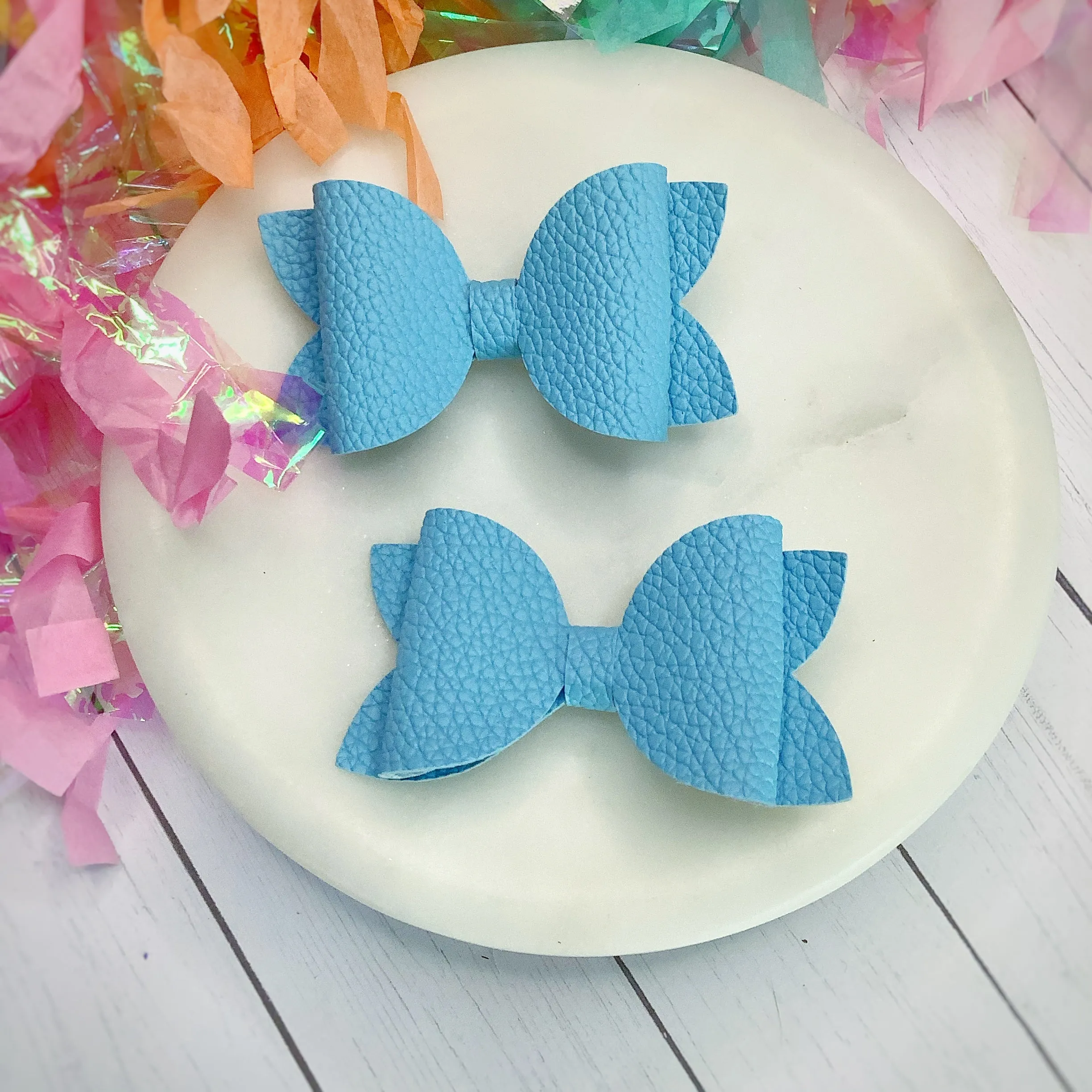 Solid Faux Pebbled Leather Riley Bow Collection
