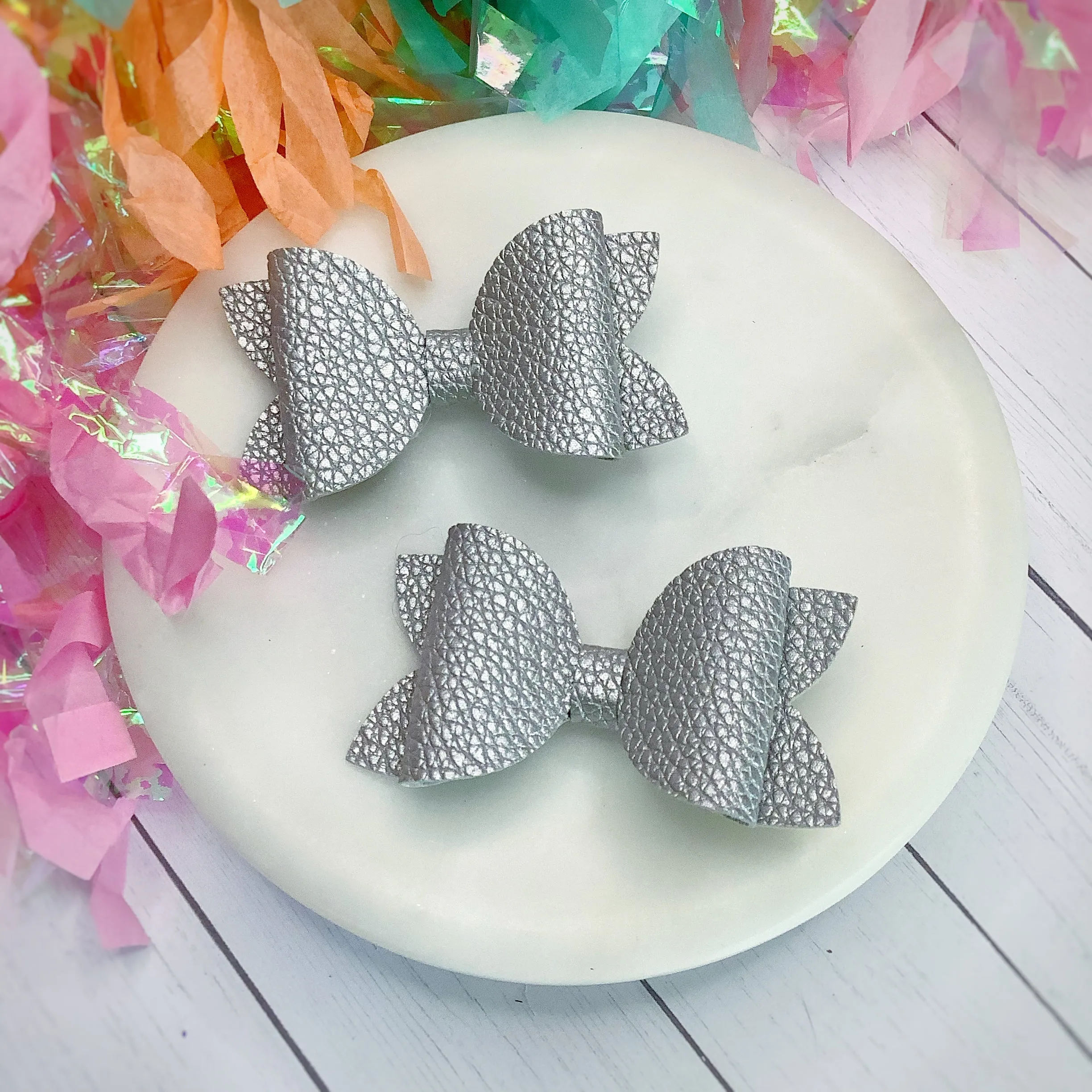 Solid Faux Pebbled Leather Riley Bow Collection