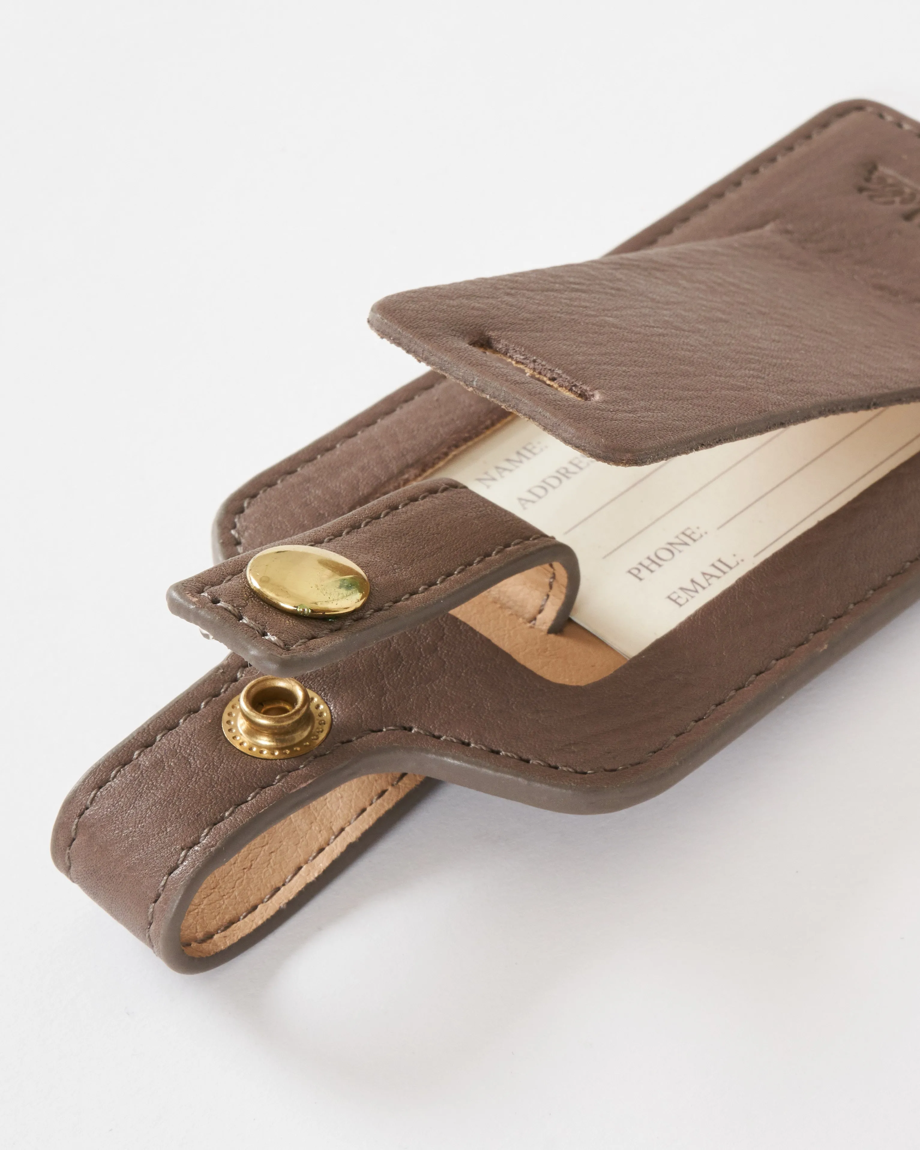 taupe leather luggage tag