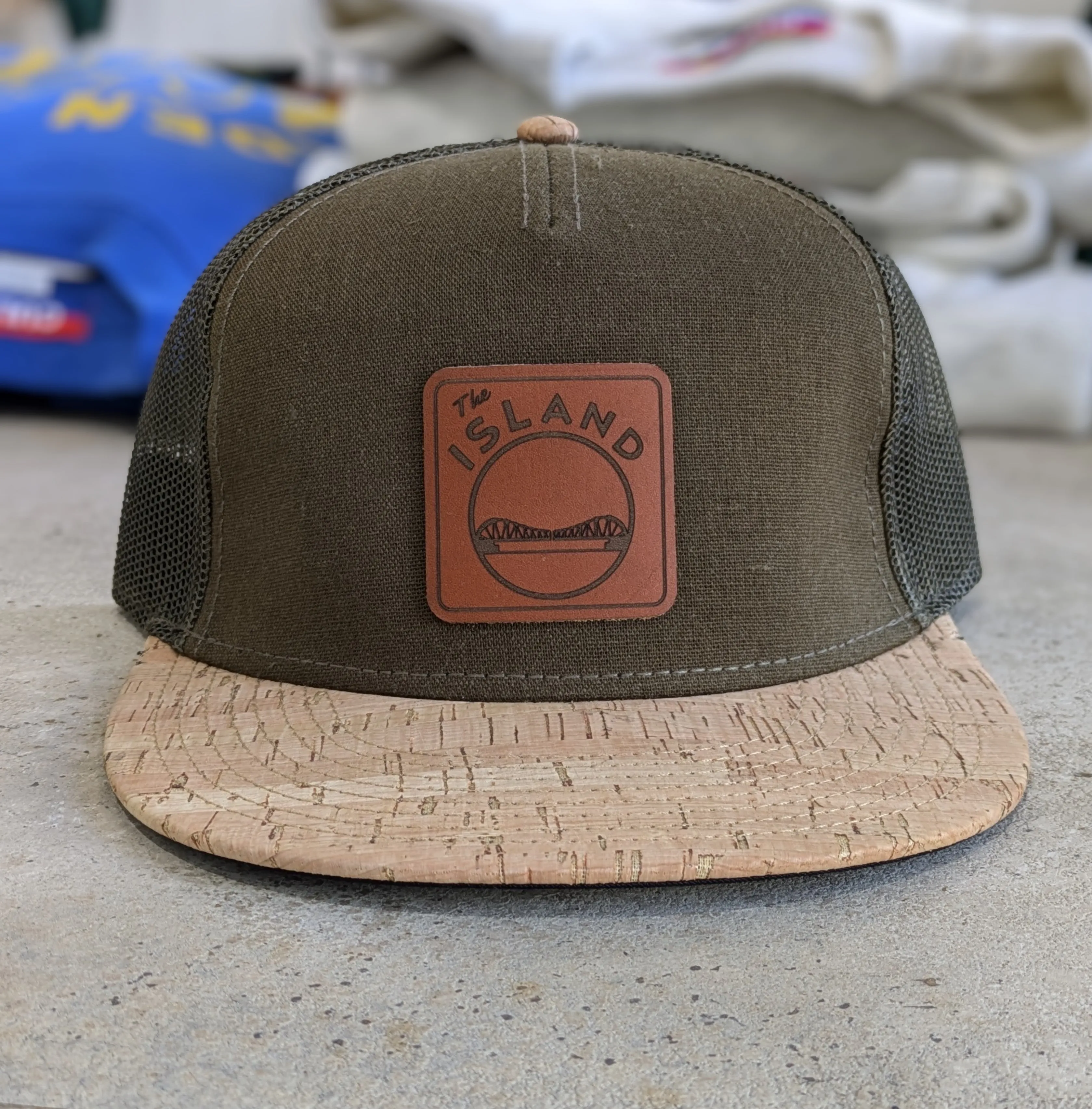 THE ISLAND LEATHER PATCH FLAT BILL HAT