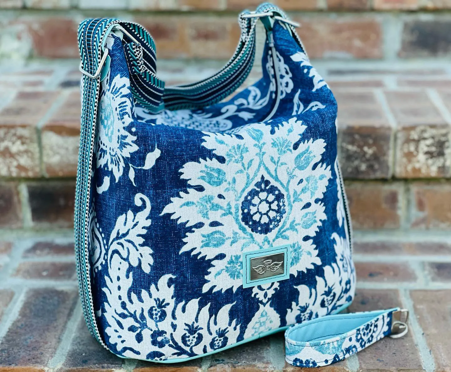 The Krystal Convertible Handbag in Magnolia Floral