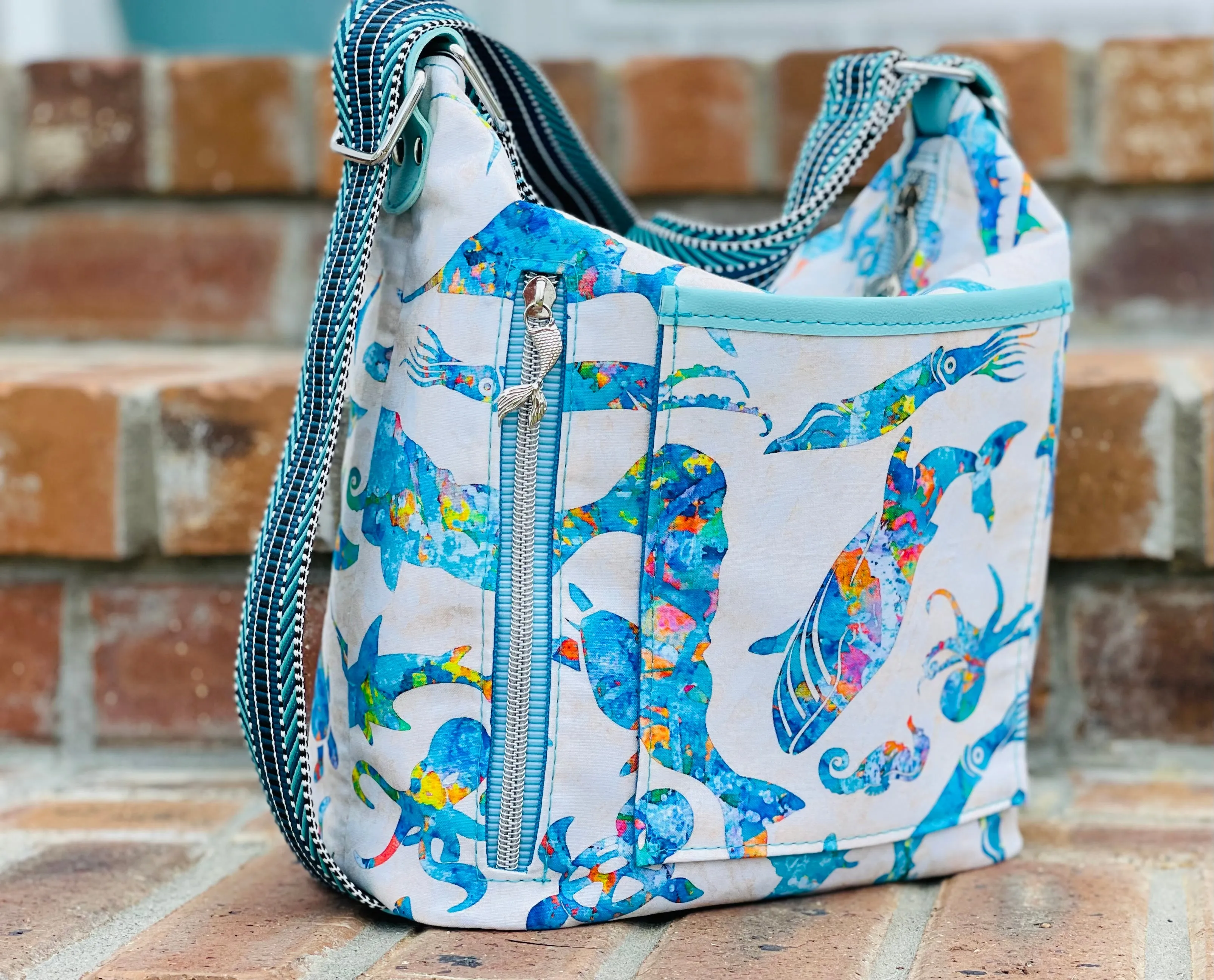 The Krystal Convertible Handbag in Sealife 1