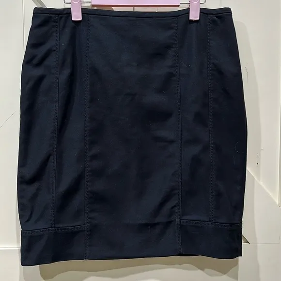 WHBM black zippered skirt. Size 12. Has lines going down for a flattering look.